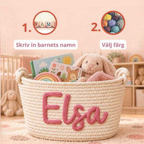 Korg med namnet Elsa i rosa garn, fylld med gosekanin, böcker och filt – skriv in barnets namn, välj färg